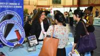 A file photo showing attendees at a Columbia University's annual career expo is shown.